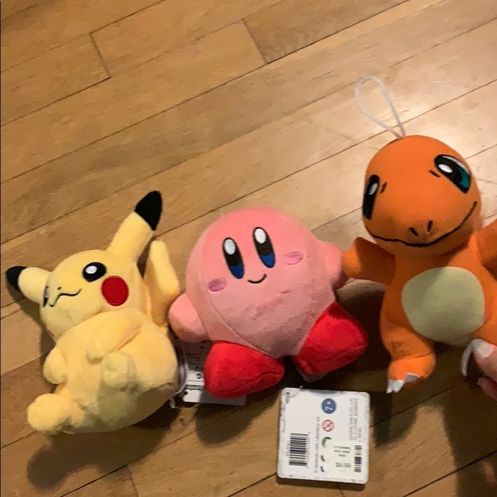 Pikachu , Kirby, and charmander plushies
